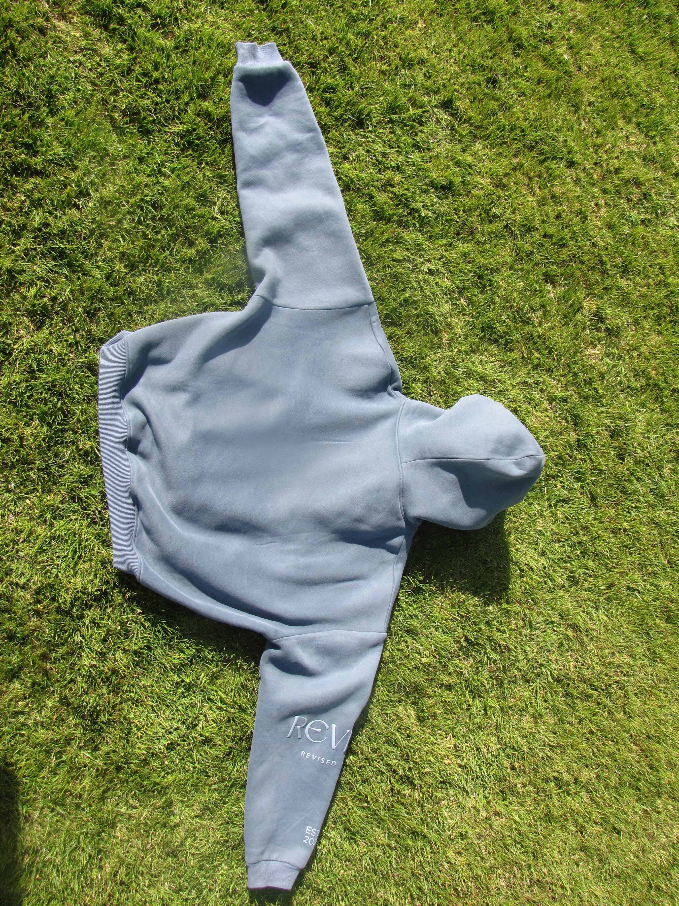Blue cropped hoodie back view